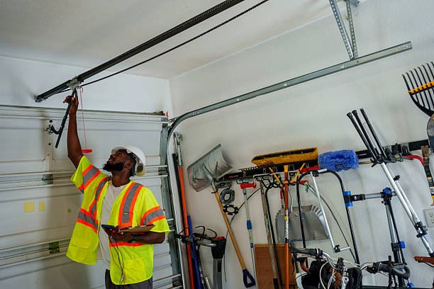 Professional Garage Door Installation technician working in Edinboro, PA